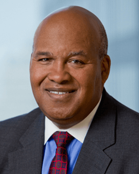 Lawrence V. Jackson, , Assurant Board Member, dressed in a suit and tie and looking at the camera